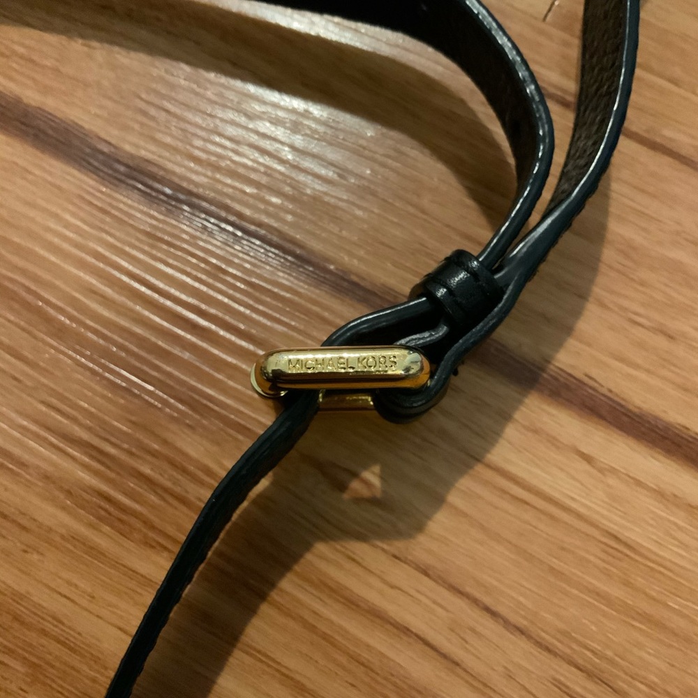 Black Michael Kors bag strap